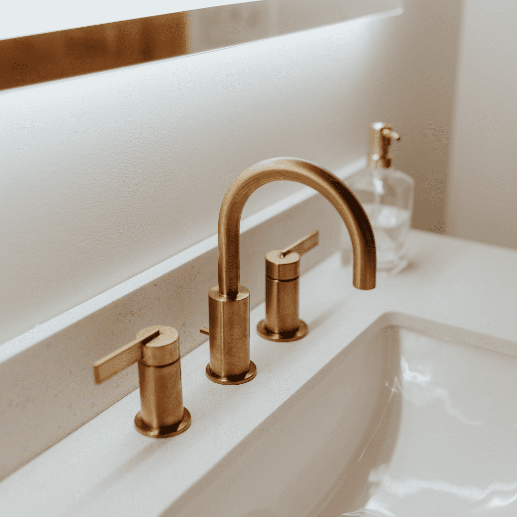 Gold faucet and modern sink in bride’s suite bathroom at Grahams Estate Gallatin TN