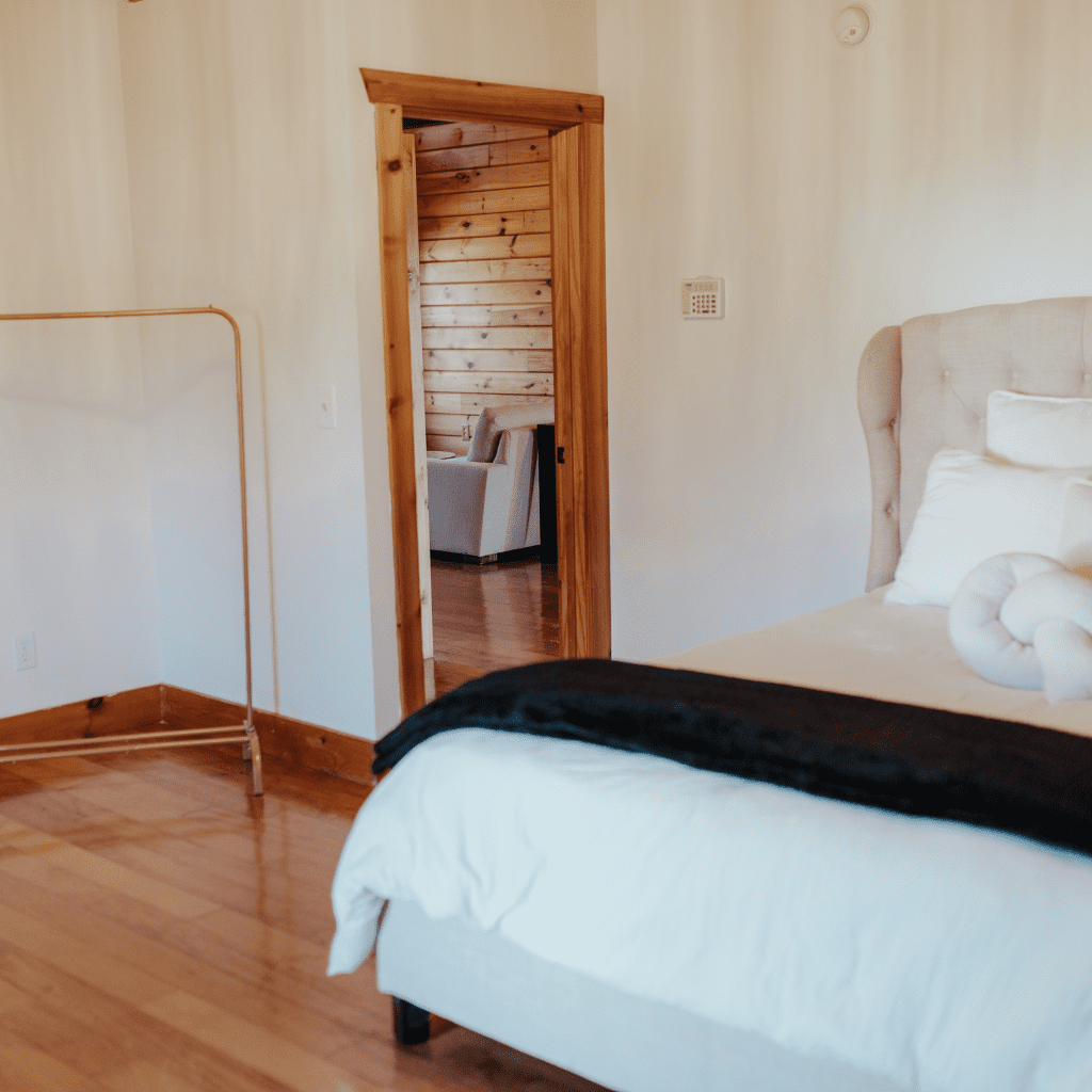Sunlight shining through window onto wood floor in bride’s suite at Grahams Estate Gallatin TN