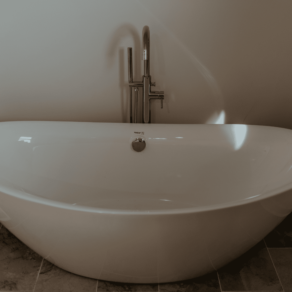 Freestanding modern bathtub in groom’s gallery at Grahams Estate Gallatin TN