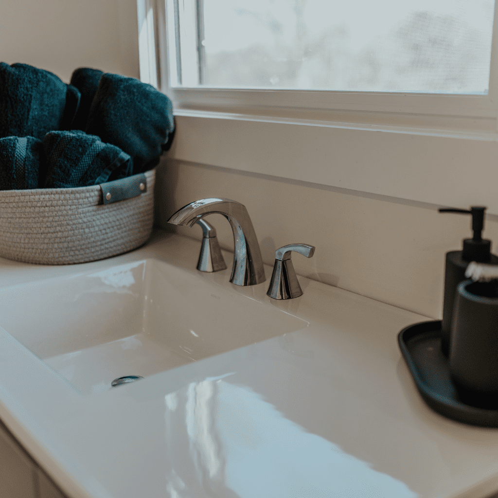 Modern sink and counter with towels in groom’s gallery at Grahams Estate Gallatin TN
