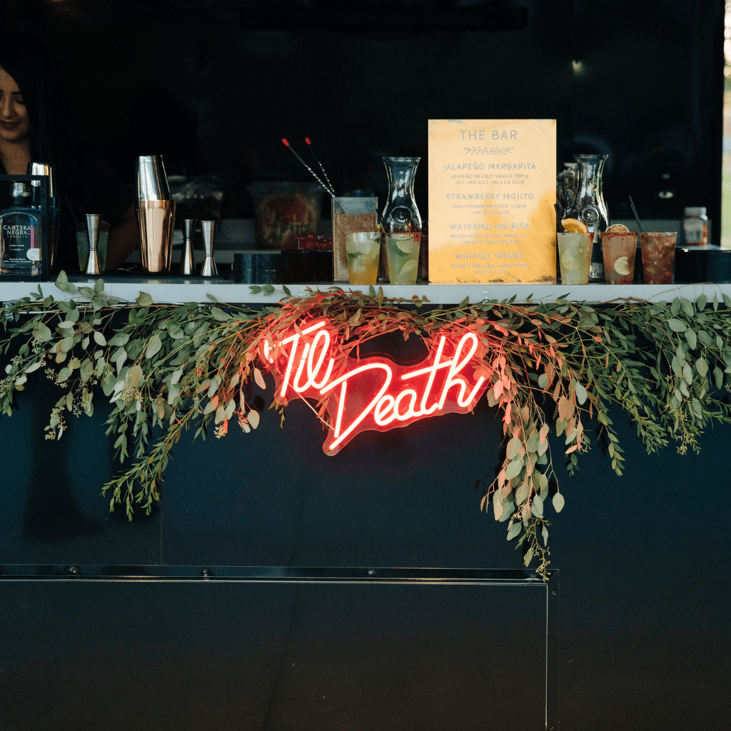 Wedding bar with neon sign reading Til Death at Grahams Estate Gallatin Tennessee