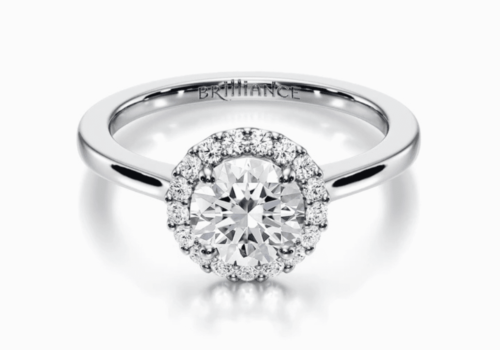 Halo engagement ring setting with pave diamonds