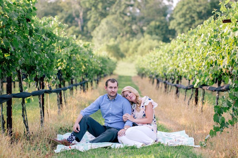 Couple enjoying wine at Arrington Vineyards near Nashville at sunset