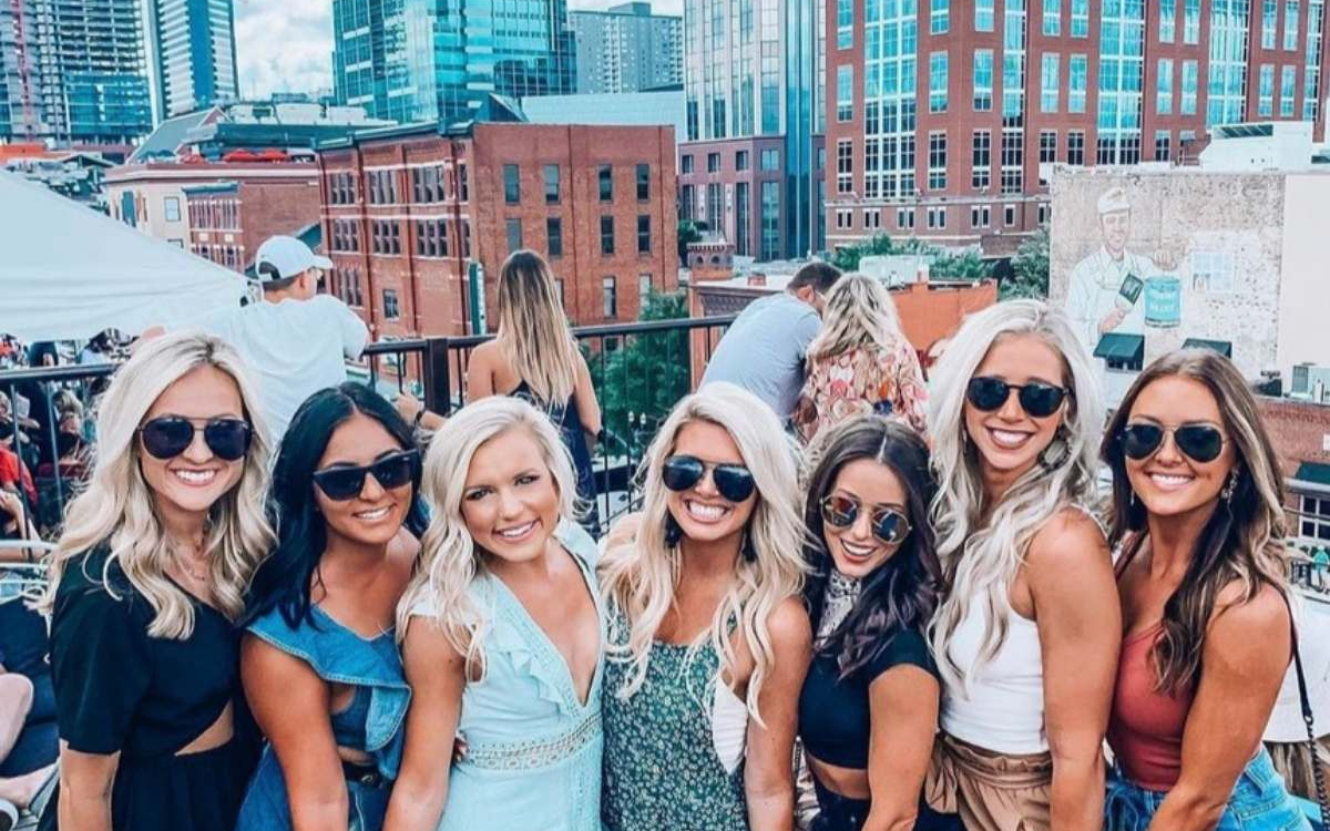 Brunch table with mimosas and bridesmaids in Nashville