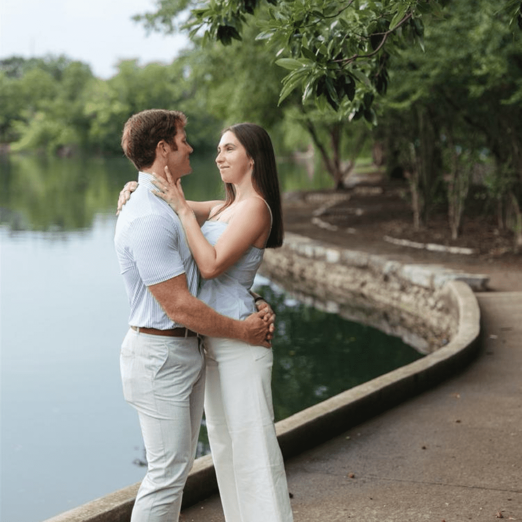 Engaged couple enjoying a romantic evening overlooking downtown Nashville