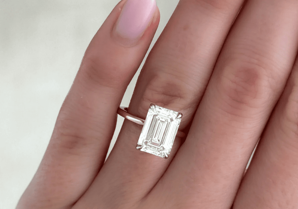 Modern emerald-cut engagement ring with minimalist band