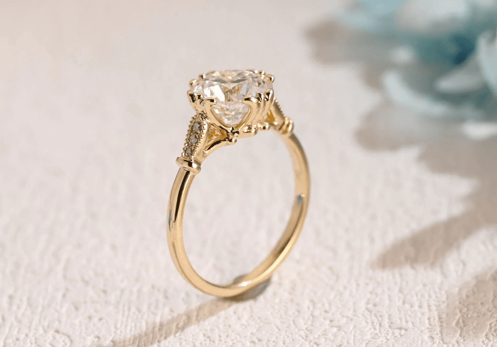 Vintage-inspired engagement ring with filigree and cushion diamond