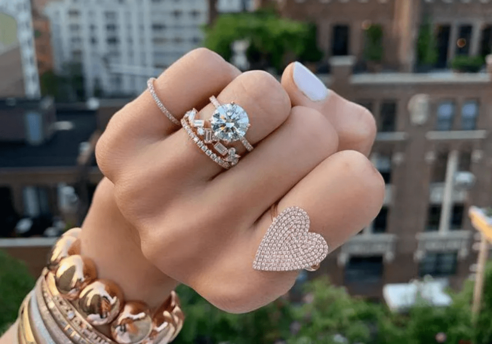 Engagement rings styled with luxury fashion accessories