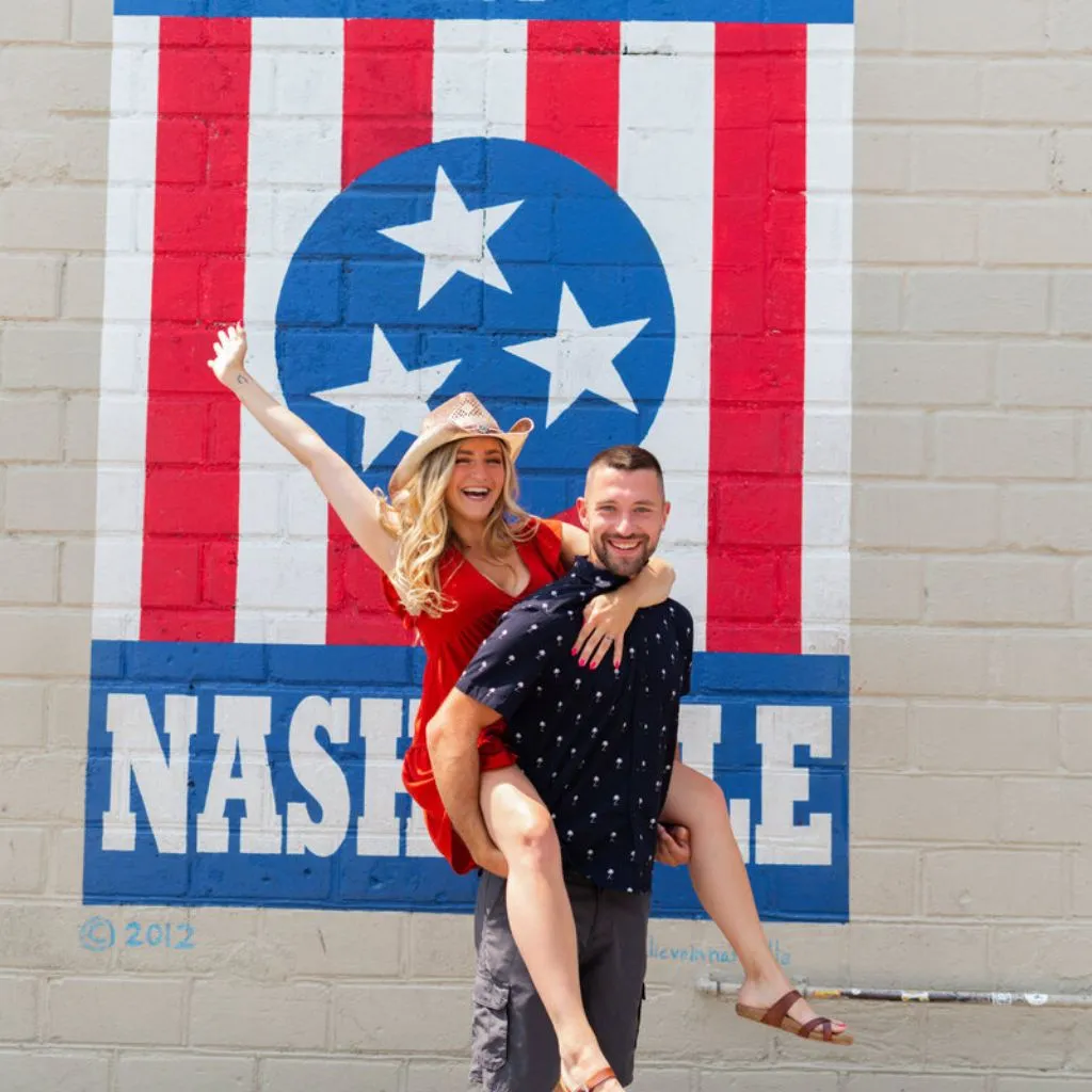 Fun engagement photos in Nashville's 12 South neighborhood near murals