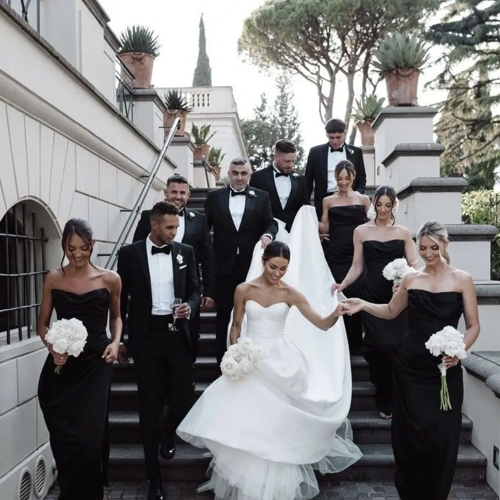Classic black-tie wedding reception setup with polished tablescapes and neutral tones