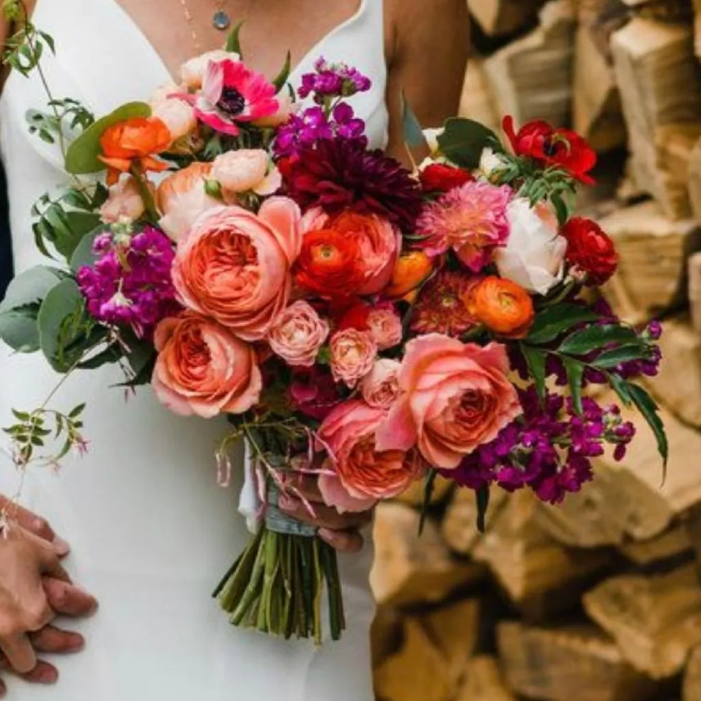 Bold color-forward wedding florals with rich hues and expressive design