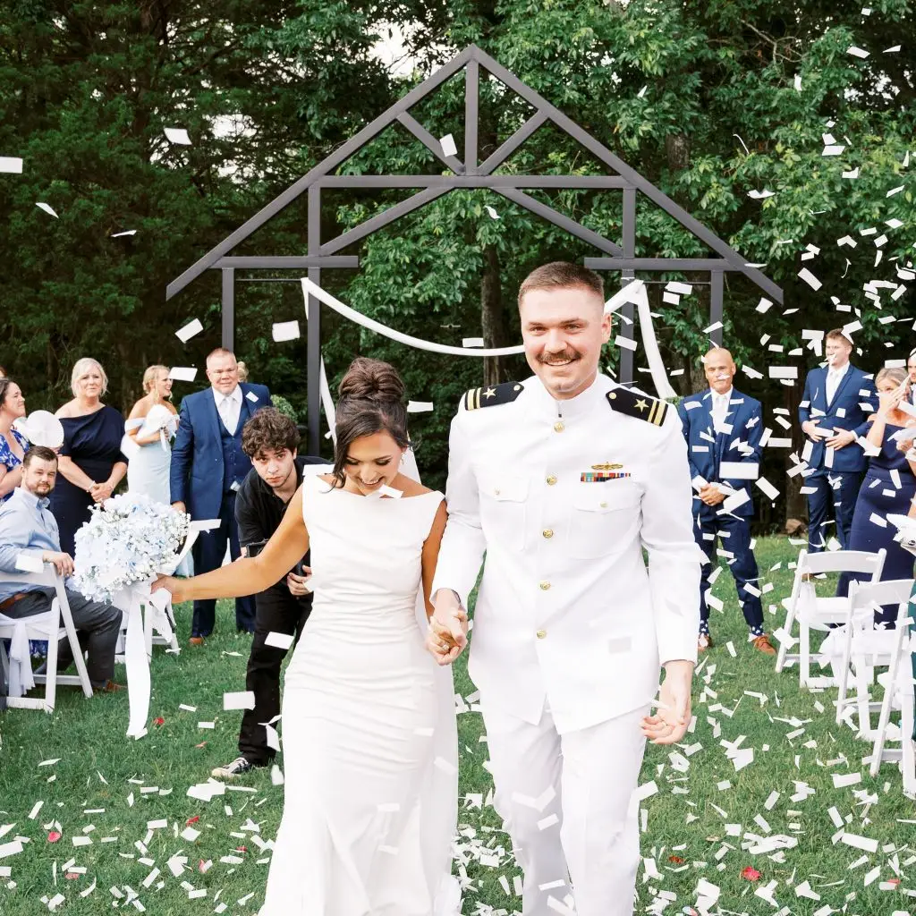 Bride and groom confetti exit after outdoor ceremony at Grahams Estate in Gallatin TN.