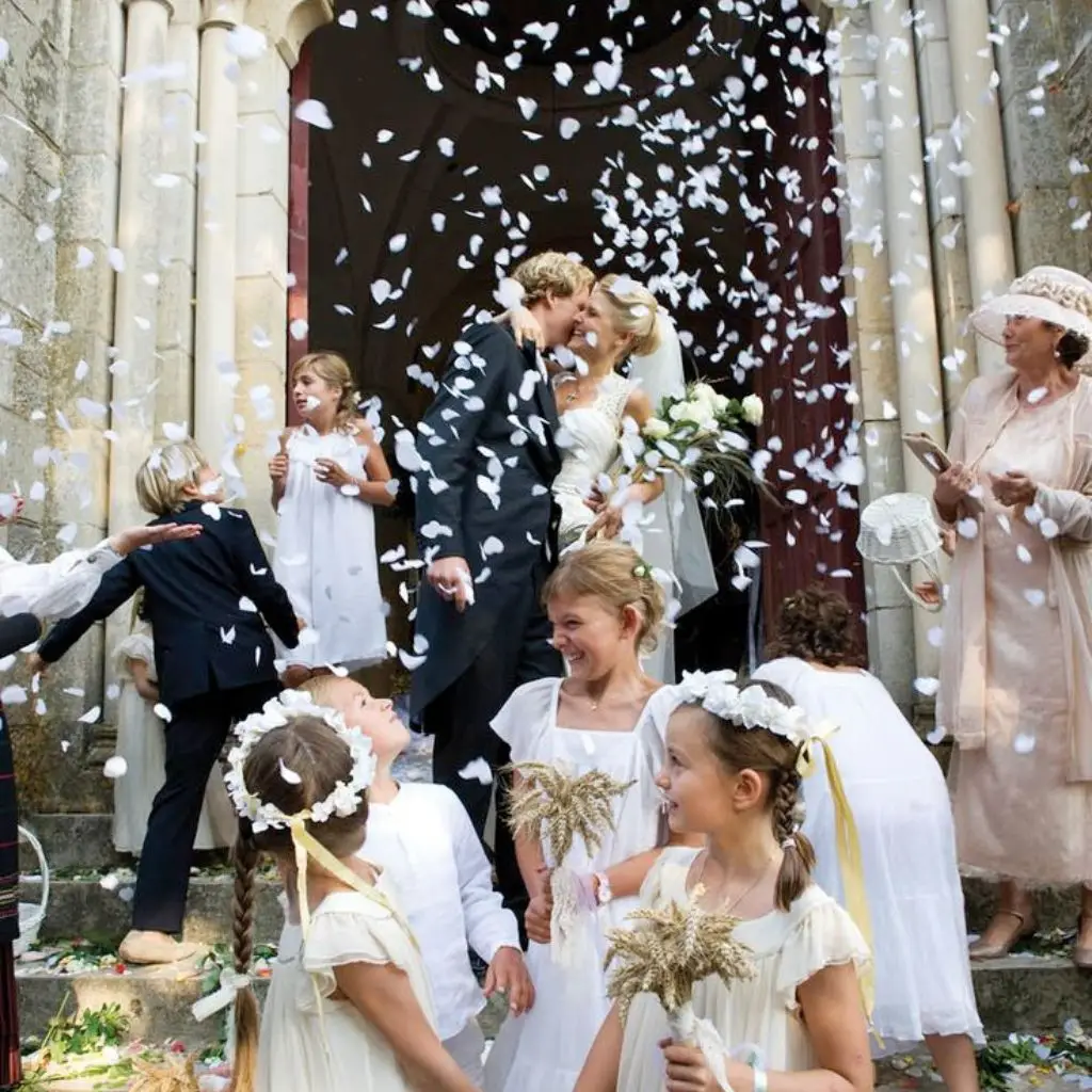 Classic church wedding exit with traditional architecture and joyful celebration
