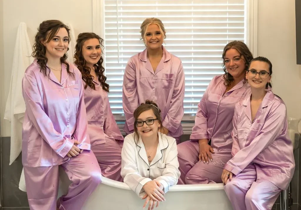 Bridesmaids getting ready in the Grahams Estate bridal suite inside the soaking tub area