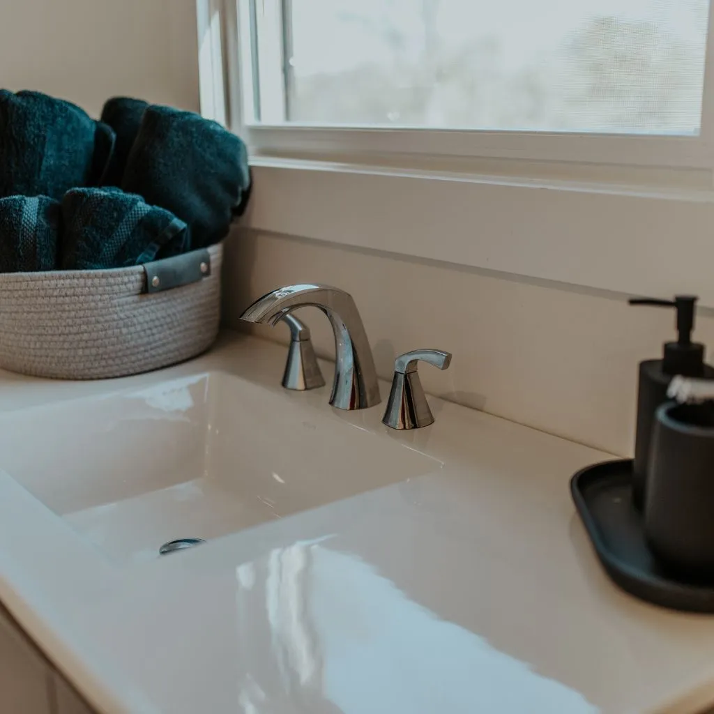 Groom’s suite bathroom sink and towel setup at Grahams Estate Gallatin TN