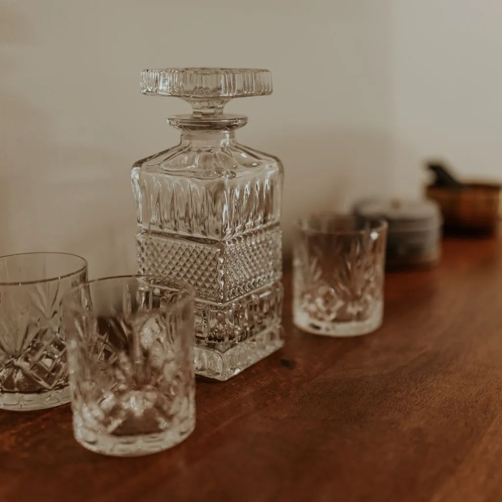 Whiskey decanter and glasses inside the groom’s suite at Grahams Estate Gallatin TN
