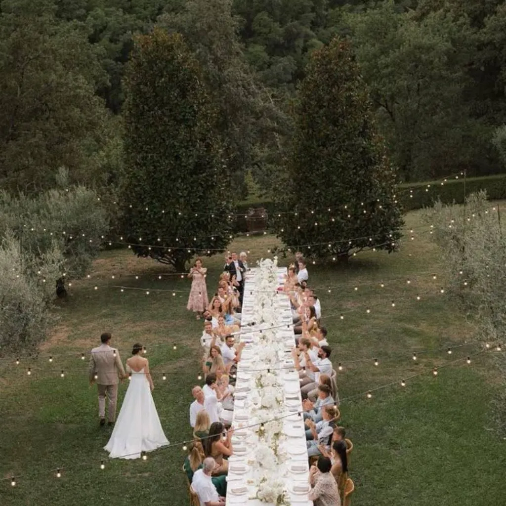 Luxurious micro-wedding tablescape with layered details and candlelight