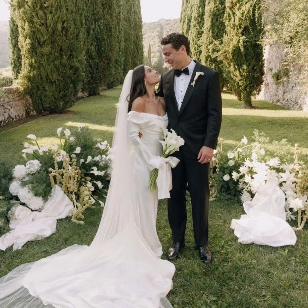 Modern editorial wedding reception design with clean tablescapes and dramatic lighting