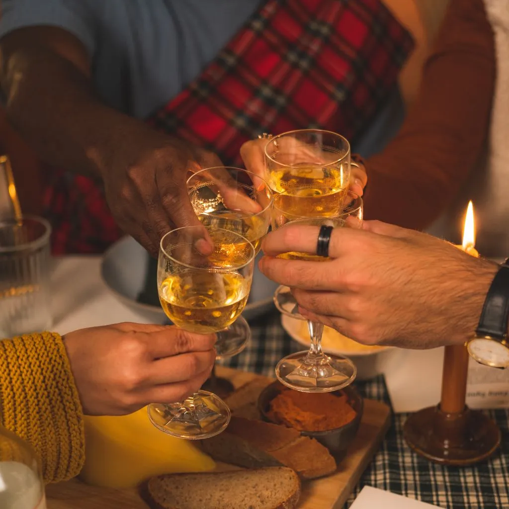 Friends raising glasses for a fall celebration in Nashville