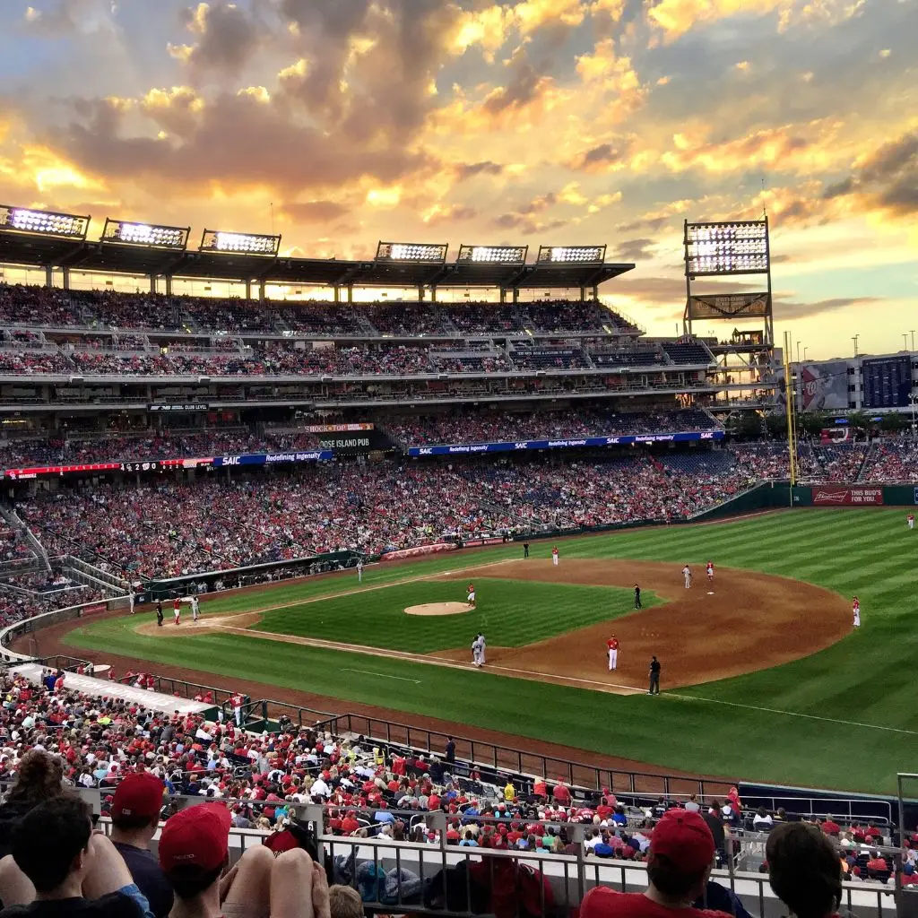 Crowd watching a Nashville Sounds baseball game at First Horizon Park in summer