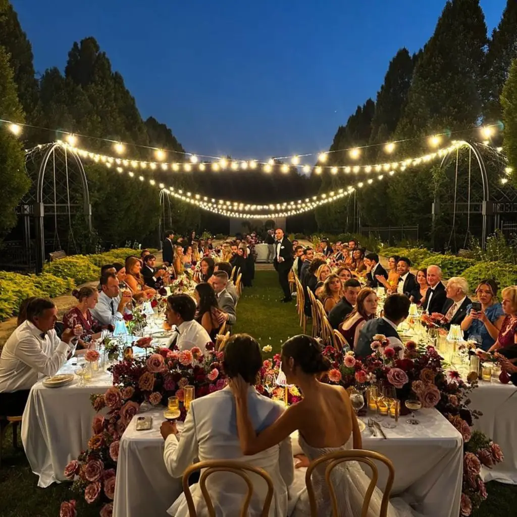 Romantic countryside wedding reception at an estate with candlelight and elegant tablescapes