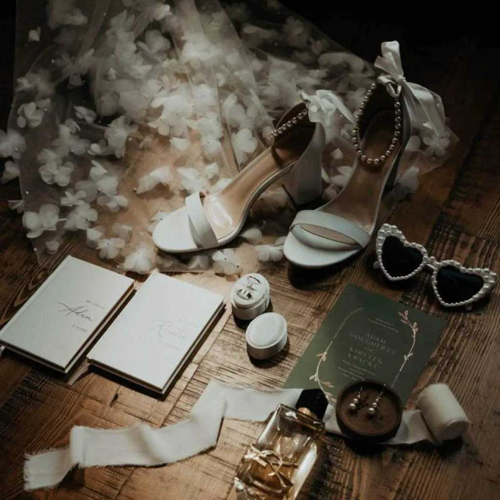 Vintage wedding flatlay with heirloom details and lace accents