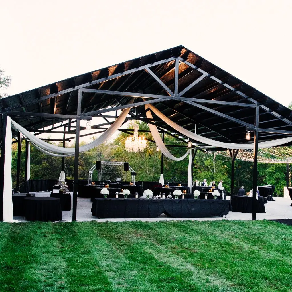 Outdoor wedding pavilion set up for a reception at a wedding venue in Gallatin TN.